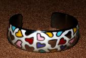Браслет, покрытый разноцветной эмалью Браслет, покрытый разноцветной эмалью
